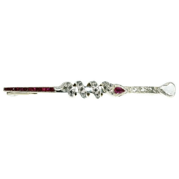 Vintage pin with diamonds and rubies snake around the Rod of Asclepius